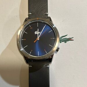Lacoste Collection Watch With 42mm NavyBlue Face and Grey Leather Band.
